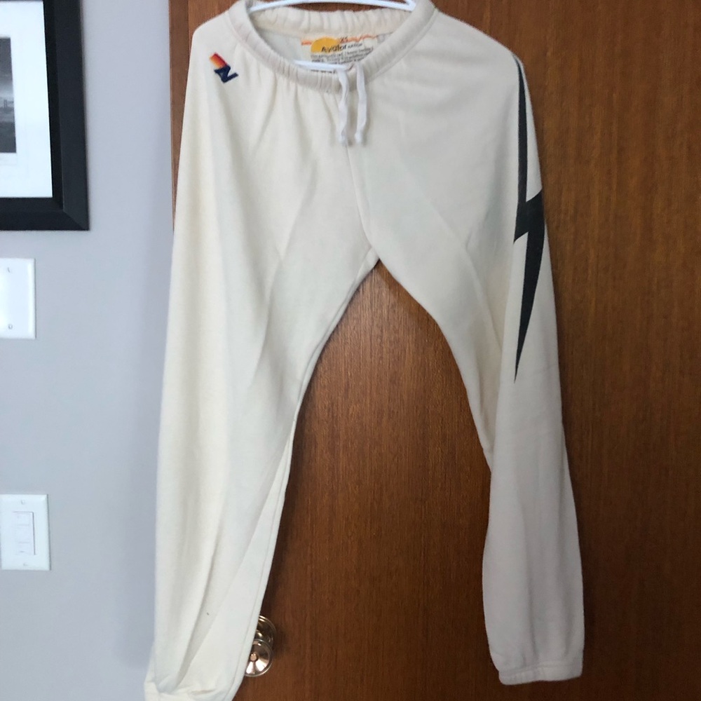 Authentic Aviator Nation Cream Joggers with Black lighting bolt